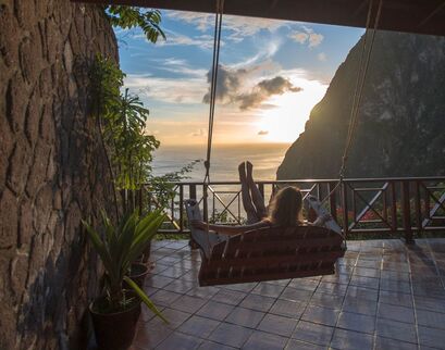 Woman Relaxing on Ladera Resort Balcony in St. Lucia